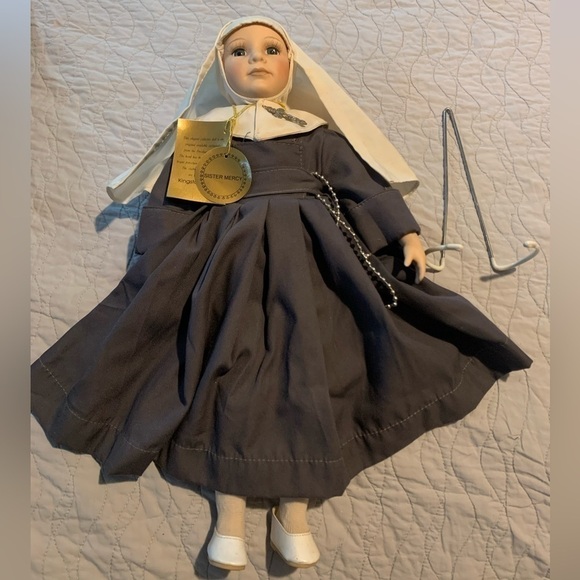 kingstate corp Other - Kingstate Corp Sister Mercy Porcelain doll, with windup music box in back